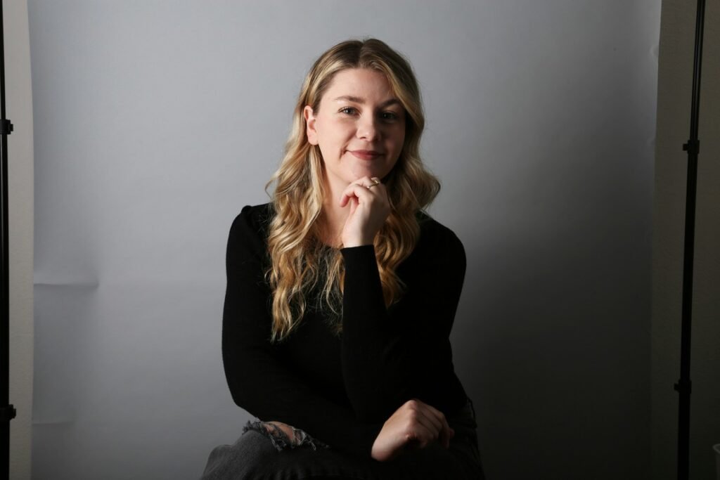 Woman sitting straight with good posture and smiling